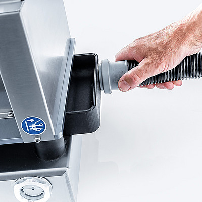 Dirt tray with suction socket